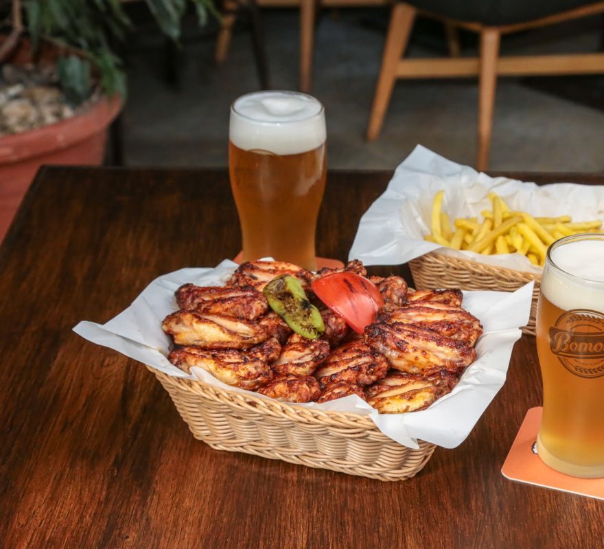 Chicken wings, fries and beer